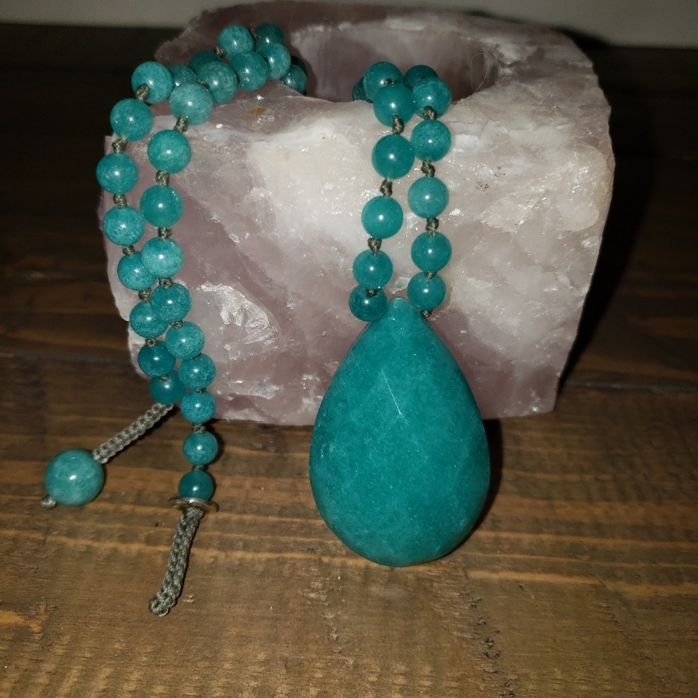 Green stone necklace.